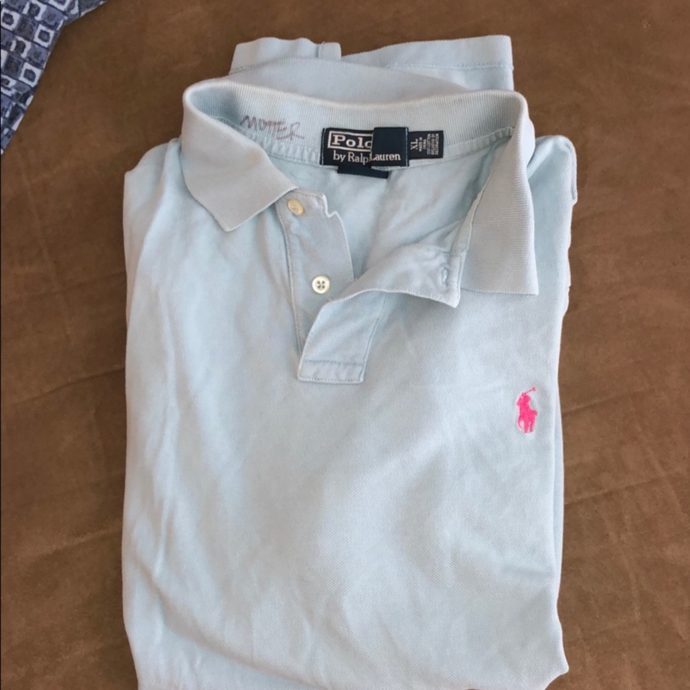 Light blue polo with pink logo